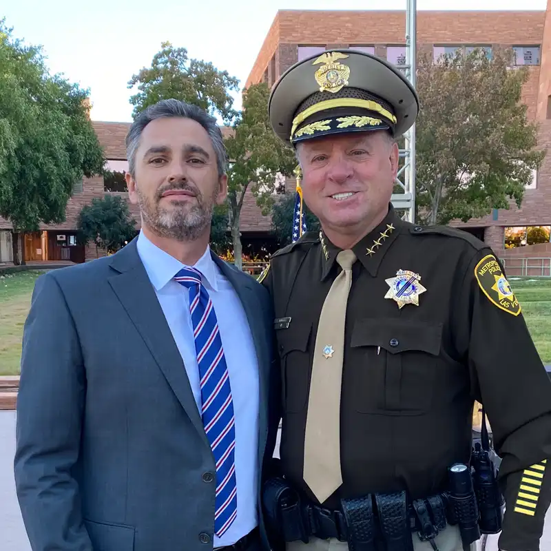 Sheriff Kevin McMahill and Michael Allmon